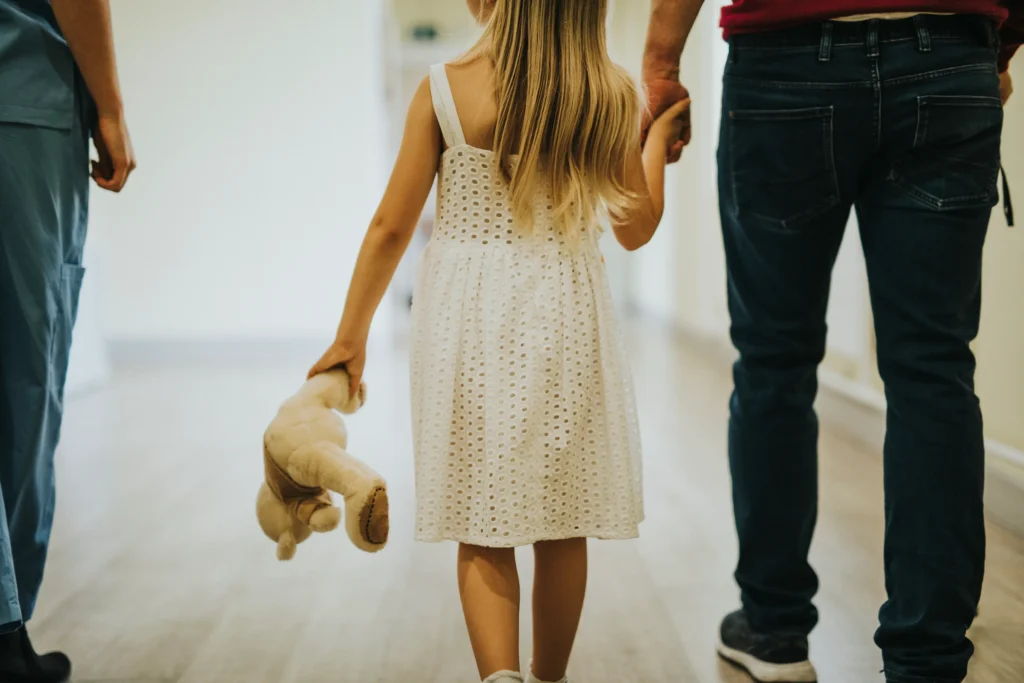 Daughter walking with father